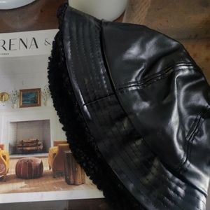 Black fur bucket hat.